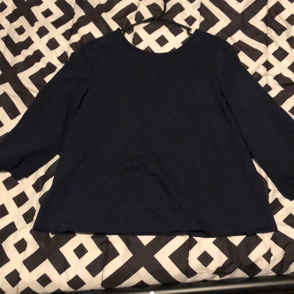 Flare top with cropped sleeves and detailed back